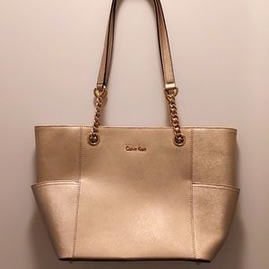 Calvin Kline gold purse